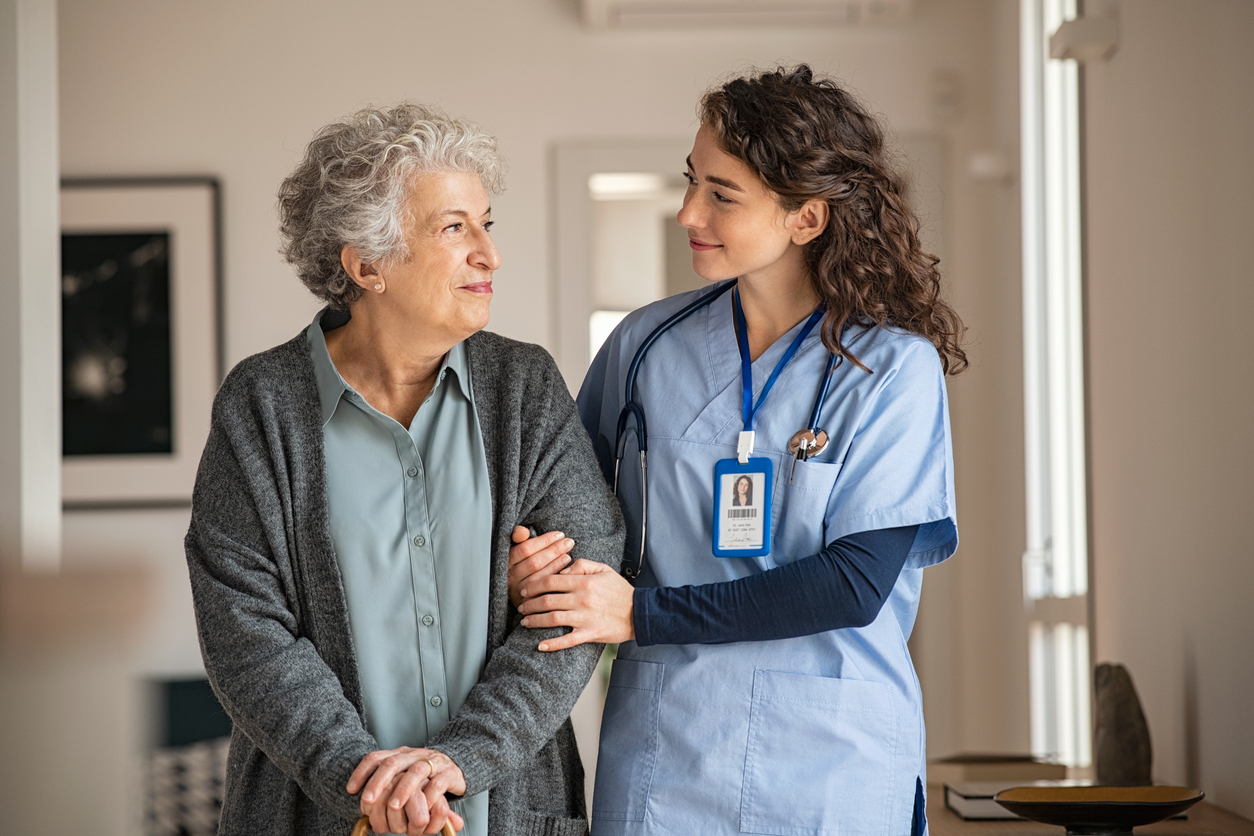 Nurse walking with older adult