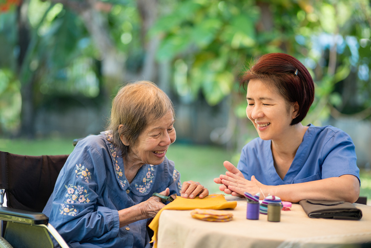 nurse in community setting with older woman